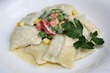 Аgnolotti- итальянские пельмени с горохово- сливочной начинкой под сметанным соусом.