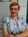 в роли хозяйки кафэ Грейс